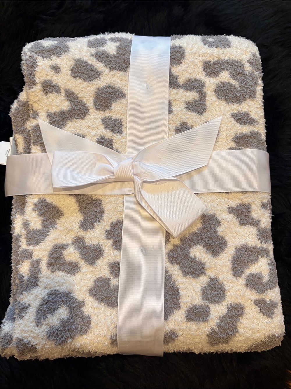 cupcakes & cashmere Plush Leopard-Pattern Throw in Cream and Gray